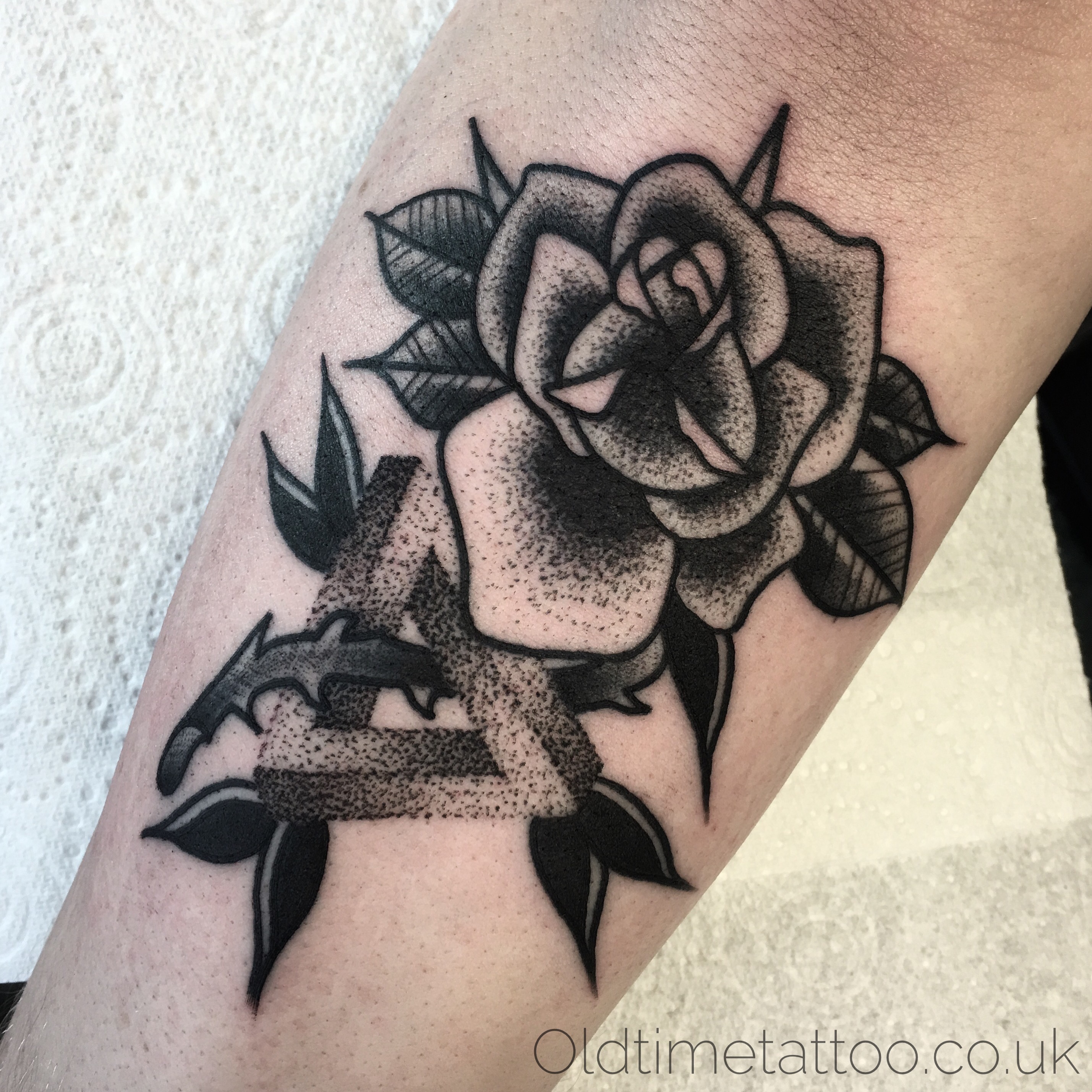 Dotwork Penrose Triangle Tattoo on the Bicep